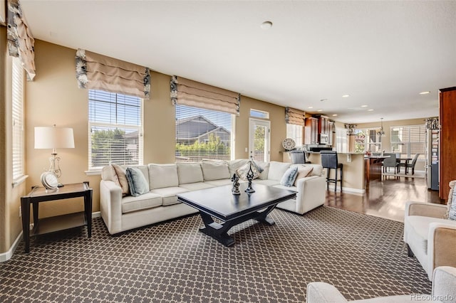 26764 E Canyon Ave, Aurora, CO 80016 - carpeted living area featuring baseboards and recessed lighting