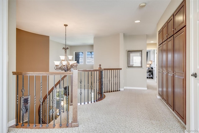 26764 E Canyon Ave, Aurora, CO 80016 - corridor featuring a chandelier, baseboards, and recessed lighting