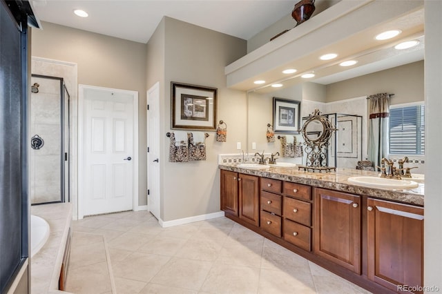 26764 E Canyon Ave, Aurora, CO 80016 - full bath featuring a stall shower, double vanity, tile patterned flooring, recessed lighting, and a bath