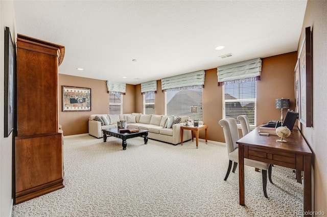 26764 E Canyon Ave, Aurora, CO 80016 - living room featuring light colored carpet, baseboards, and recessed lighting