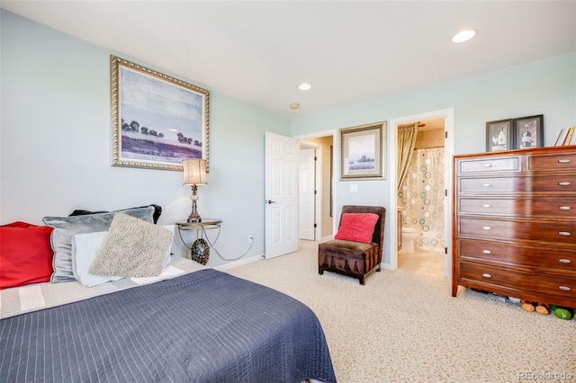 26764 E Canyon Ave, Aurora, CO 80016 - carpeted bedroom with baseboards, ensuite bath, and recessed lighting