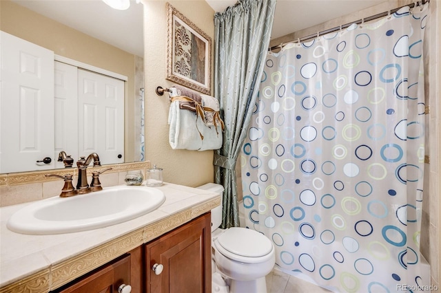 26764 E Canyon Ave, Aurora, CO 80016 - full bath featuring toilet, vanity, and a shower with shower curtain