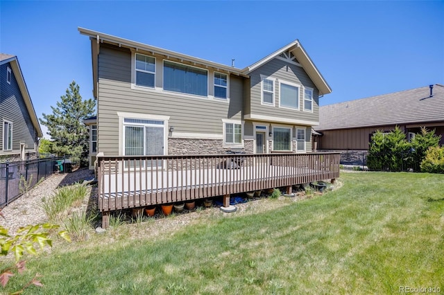 26764 E Canyon Ave, Aurora, CO 80016 - rear view of house featuring a deck and stone siding