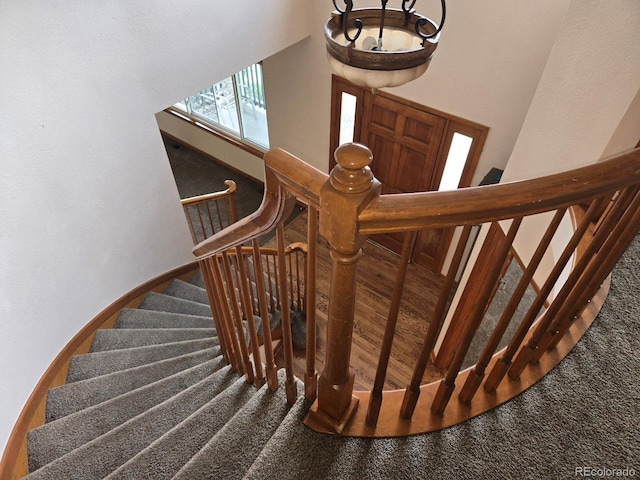 21064 E Crestline Cir, Centennial, CO 80015 - staircase with carpet flooring and a towering ceiling