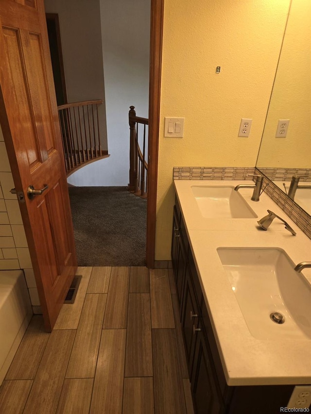 21064 E Crestline Cir, Centennial, CO 80015 - full bath with double vanity and wood finished floors