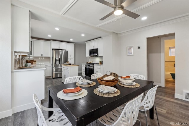 3929 Federal Blvd, Denver, CO 80211 - dining room with dark wood-style floors, ornamental molding, ceiling fan, recessed lighting, and baseboards