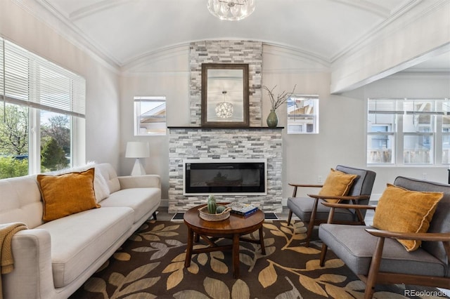 3929 Federal Blvd, Denver, CO 80211 - living room featuring a fireplace, a chandelier, and lofted ceiling