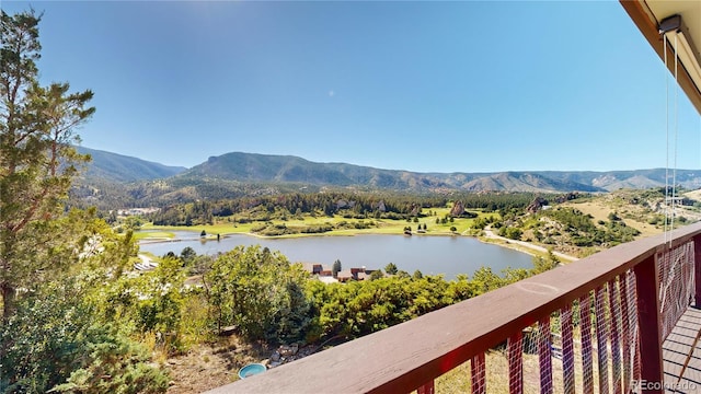 view of mountain feature with a water view