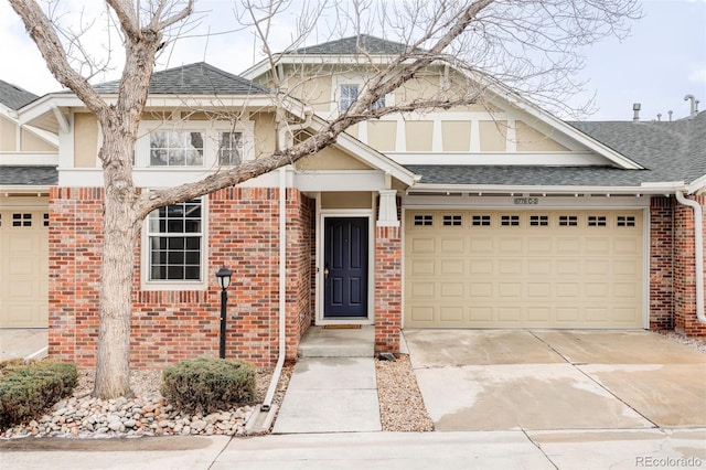 view of front of property with a garage