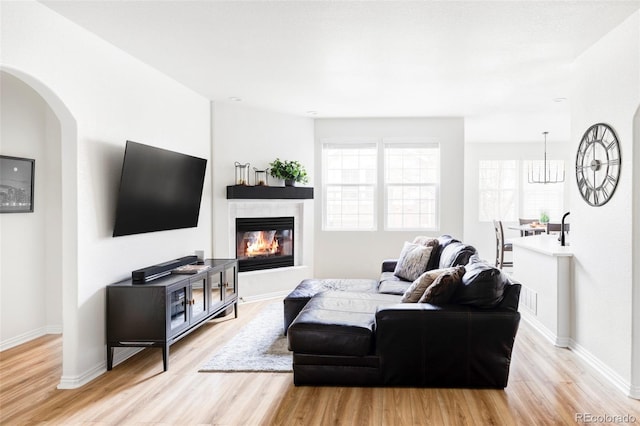 living room with light hardwood / wood-style flooring