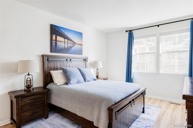 bedroom featuring light hardwood / wood-style floors