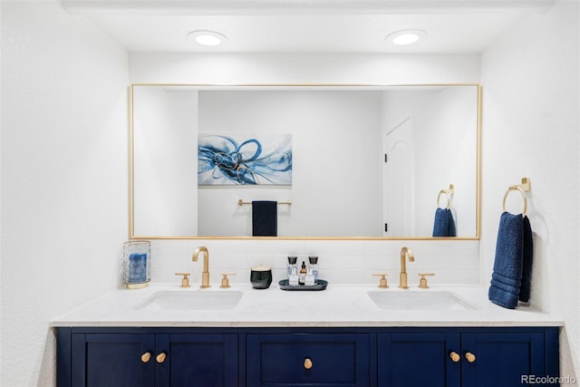 bathroom featuring vanity and decorative backsplash