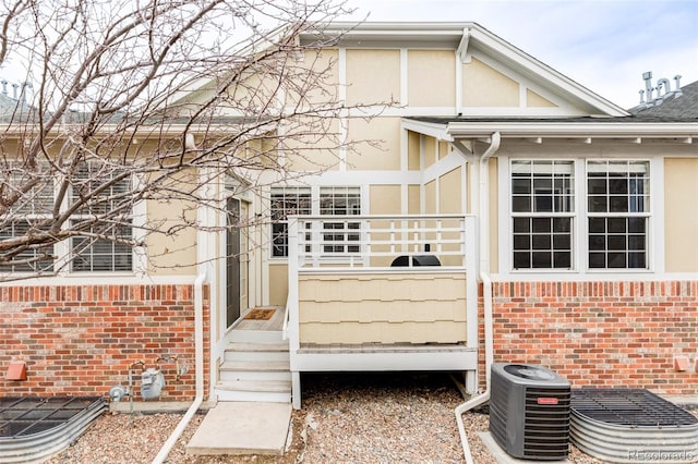 property entrance featuring central AC