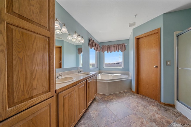 32800 E 137th Way, Brighton, CO 80603 - bathroom with a garden tub, double vanity, and an enclosed shower
