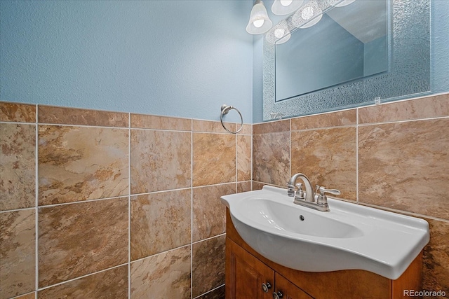 32800 E 137th Way, Brighton, CO 80603 - bathroom with vanity and tile walls