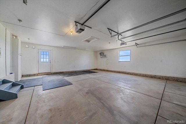32800 E 137th Way, Brighton, CO 80603 - garage featuring a garage door opener and baseboards