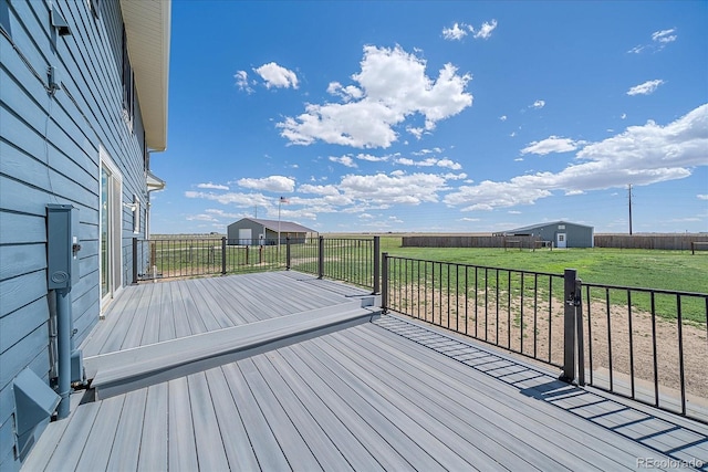 32800 E 137th Way, Brighton, CO 80603 - wooden terrace featuring a lawn and an outdoor structure