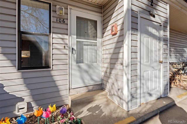 8701 Huron St Unit 5-210, Thornton, CO 80260 - view of exterior entry featuring covered porch