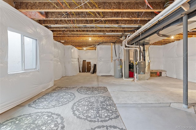 basement featuring electric water heater