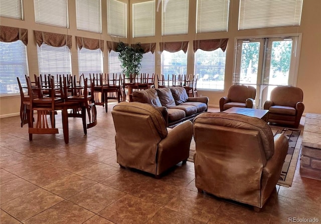 living room with tile patterned flooring