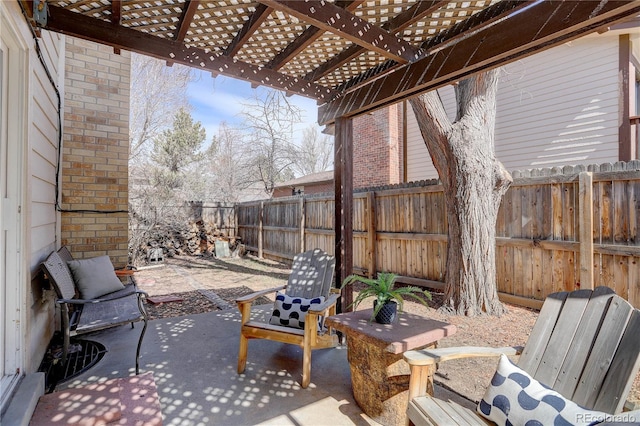 view of patio with a pergola and a fenced backyard