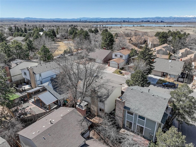 aerial view with a residential view and a mountain view