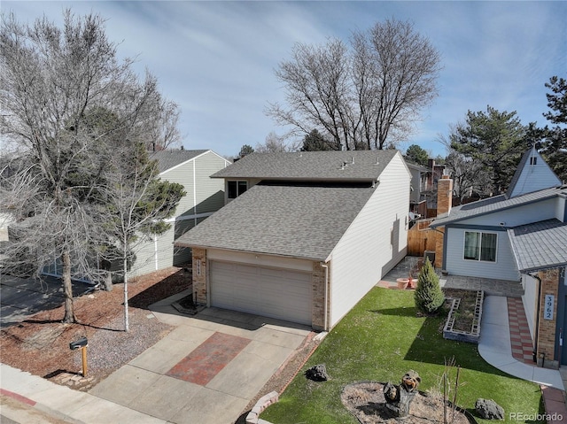 view of side of home with a lawn, fence, concrete driveway, an attached garage, and a shingled roof