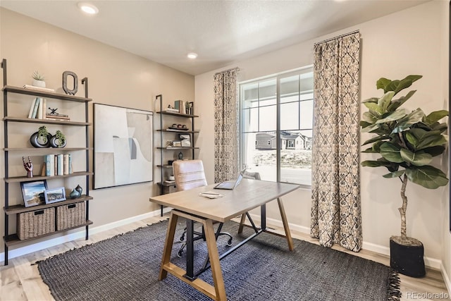 office area with hardwood / wood-style flooring