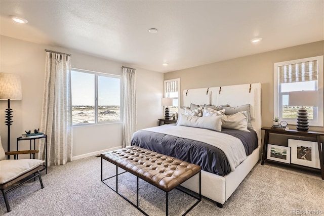 bedroom with light carpet