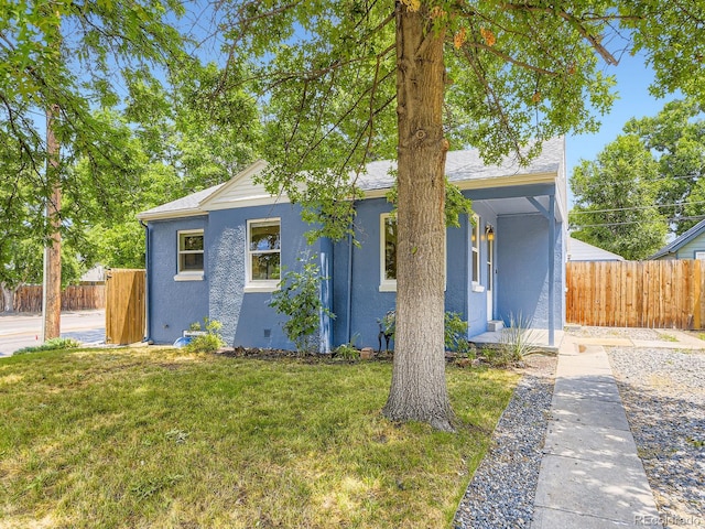2102 S Pearl St, Denver, CO 80210 - view of front of house featuring stucco siding and covered porch