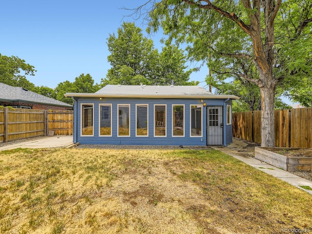 2102 S Pearl St, Denver, CO 80210 - back of house featuring a fenced backyard and a patio area