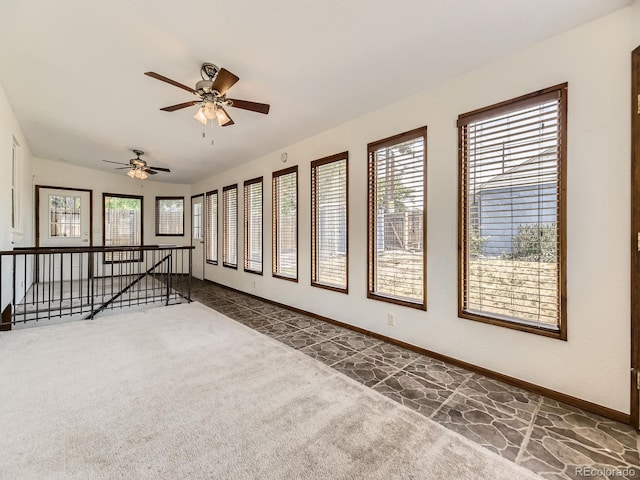 2102 S Pearl St, Denver, CO 80210 - unfurnished room featuring carpet floors, healthy amount of natural light, a ceiling fan, and lofted ceiling