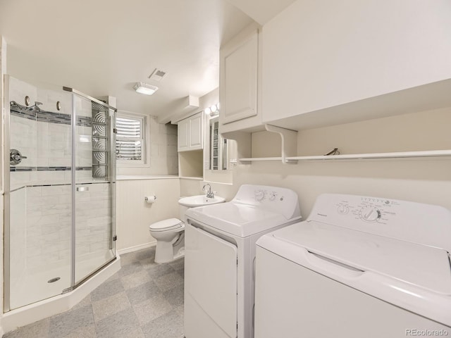 2102 S Pearl St, Denver, CO 80210 - laundry area featuring independent washer and dryer and light floors