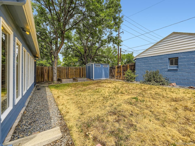2102 S Pearl St, Denver, CO 80210 - fenced backyard featuring a shed