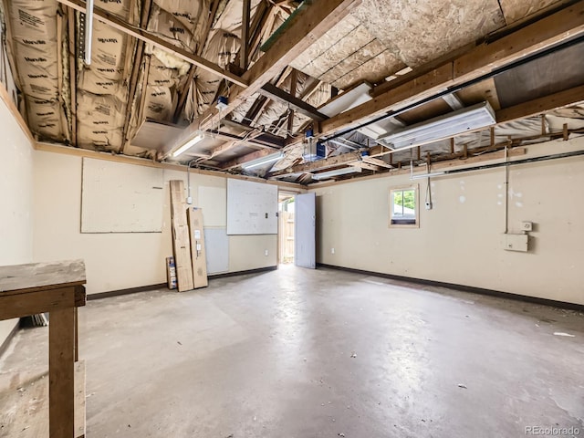 2102 S Pearl St, Denver, CO 80210 - garage featuring baseboards