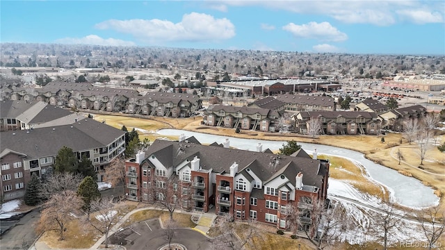 aerial view featuring a water view and a residential view