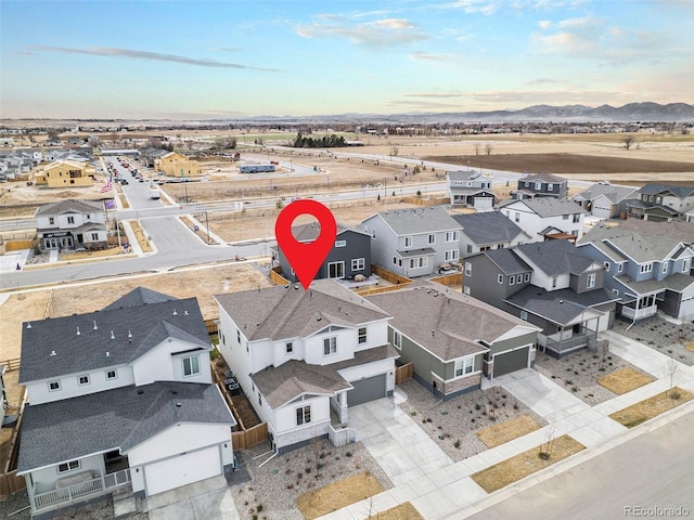 aerial view with a residential view and a mountain view