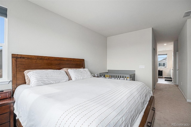 bedroom featuring baseboards, carpet, and recessed lighting