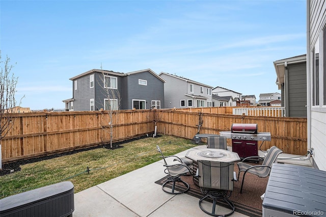 view of patio / terrace featuring outdoor dining area, a fenced backyard, a residential view, and area for grilling