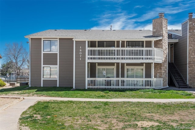 18071 E Kentucky Ave Unit 203, Aurora, CO 80017 - view of building exterior with stairway