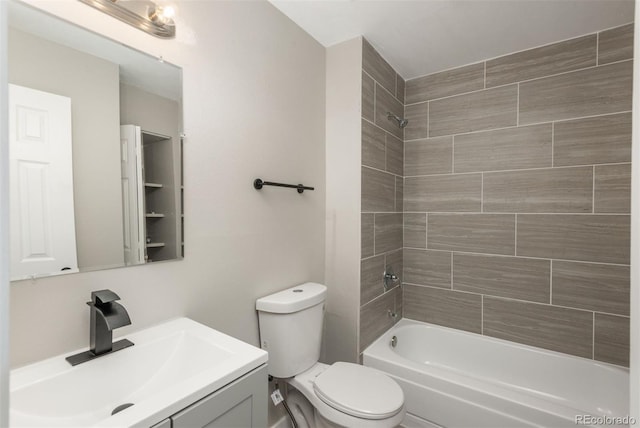 18071 E Kentucky Ave Unit 203, Aurora, CO 80017 - bathroom with toilet, washtub / shower combination, and vanity