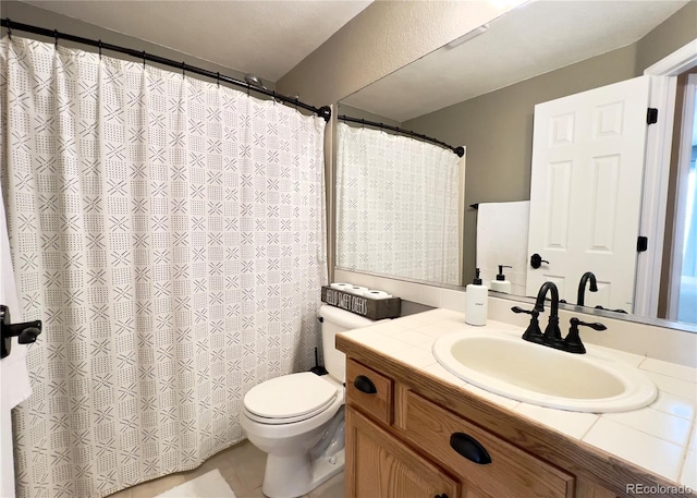 bathroom featuring a shower with shower curtain, vanity, and toilet