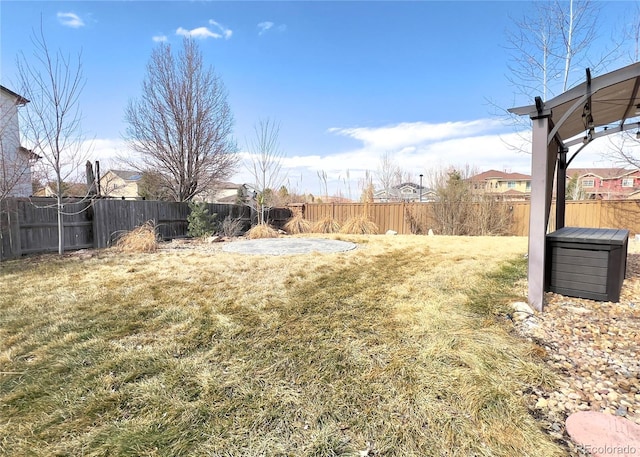 view of yard with a fenced backyard