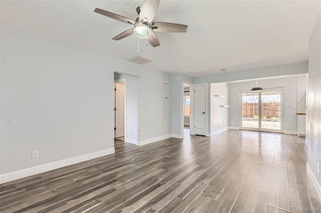 4932 Jasper St, Denver, CO 80239 - empty room with a ceiling fan, wood finished floors, and a textured ceiling