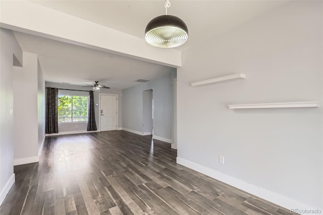 4932 Jasper St, Denver, CO 80239 - unfurnished living room featuring dark wood finished floors and ceiling fan
