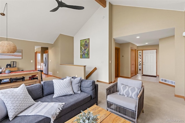 6882 Snowshoe Trl, Evergreen, CO 80439 - carpeted living area with high vaulted ceiling, a ceiling fan, beam ceiling, and recessed lighting
