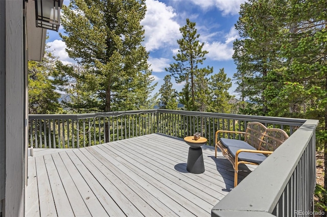 6882 Snowshoe Trl, Evergreen, CO 80439 - view of wooden terrace