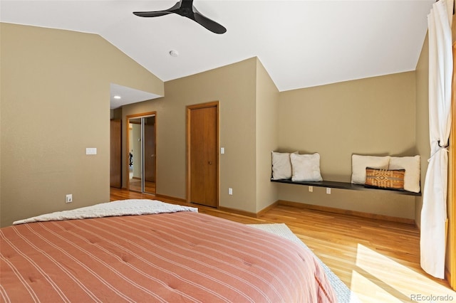 6882 Snowshoe Trl, Evergreen, CO 80439 - bedroom featuring lofted ceiling, wood finished floors, and a ceiling fan