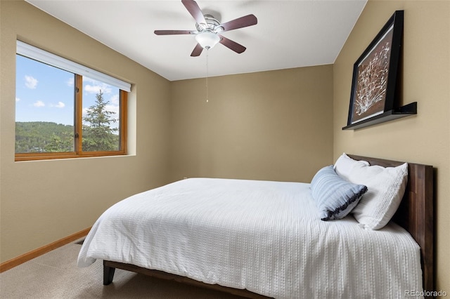 6882 Snowshoe Trl, Evergreen, CO 80439 - bedroom with carpet and ceiling fan