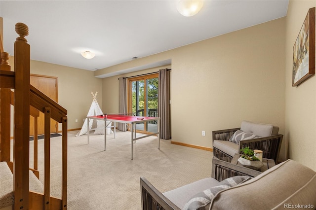 6882 Snowshoe Trl, Evergreen, CO 80439 - rec room with carpet floors and baseboards